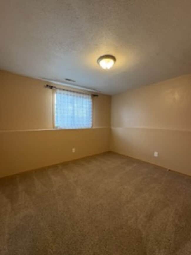 Building Photo - 4 BED | 2 BATH | SINGLE GARAGE | RAPID VALLEY