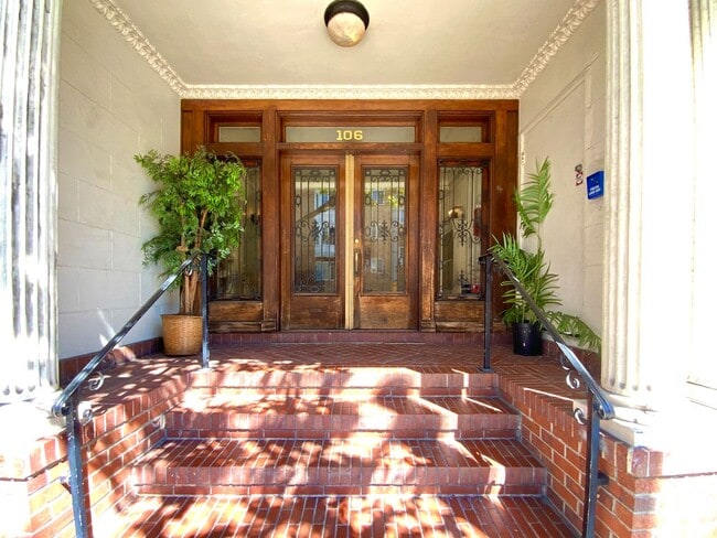 Building Photo - RENOVATED and Private. DISHWASHER, ON-SITE LAUNDRY, HARDWOOD!