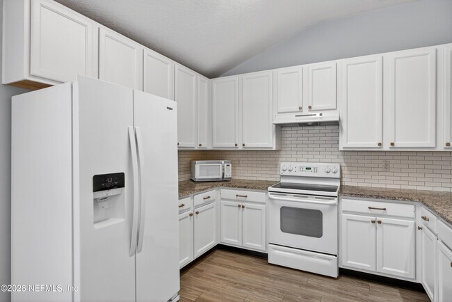 Building Photo - 6377 Island Forest Dr