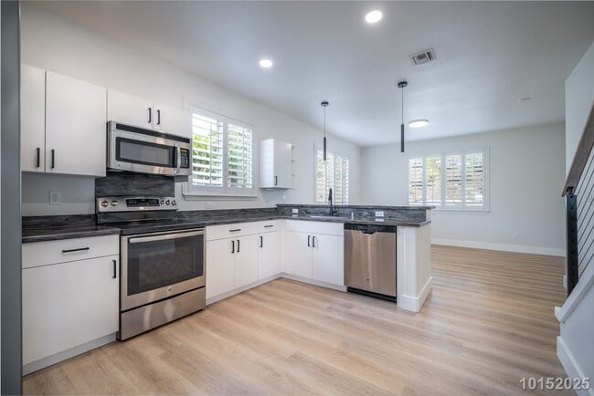 Building Photo - Available now!  Beautifully upgraded 4-bdr...
