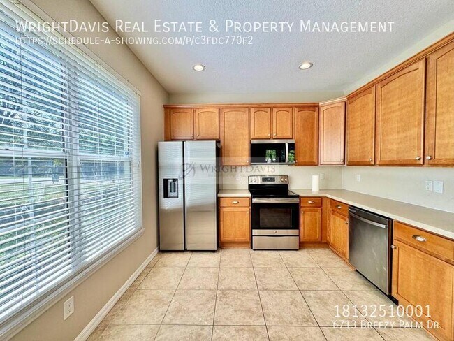 Building Photo - 6713 Breezy Palm Dr