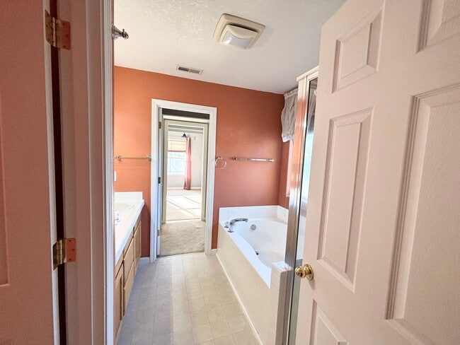 Building Photo - Stunning Remodeled Home with Office, A/C, Fenced Yard & Flexible Living Space!