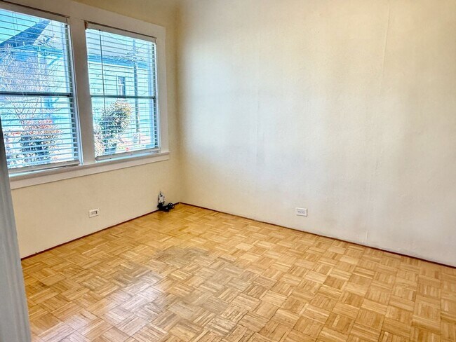 Building Photo - Cozy 2+bdrm/1 bath home w/a huge basement, washer/dryer, & off street pkg, space in the heart of ...