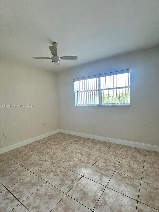 Building Photo - 8350 Sunrise Lakes Blvd