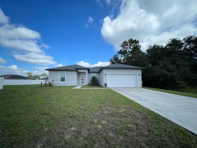 Building Photo - GORGEOUS 4 Bedroom, 2 Bathroom Home in Poi...