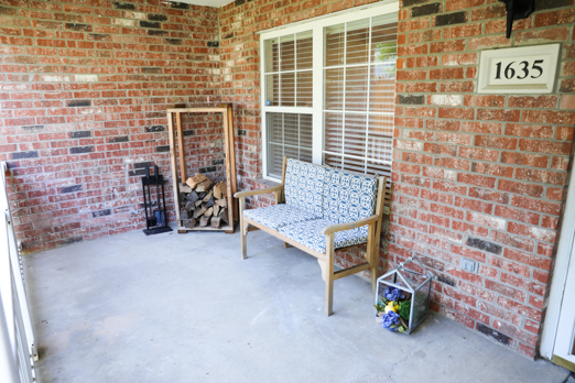 Spacious covered back porch - 1635 E 120th St