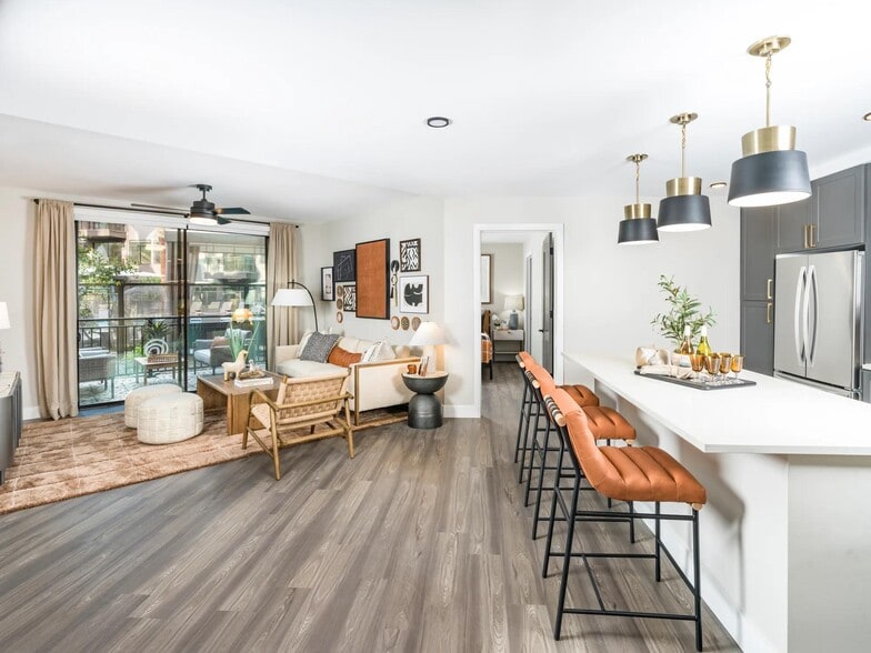 Open-concept layouts blend modern kitchens with stylish living areas, perfect for entertaining or relaxing at home. - Modera Reserve