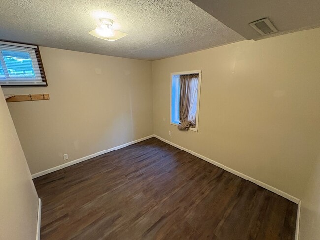 Building Photo - Spacious Single-Family Home with Fenced Backyard & Attached Garage