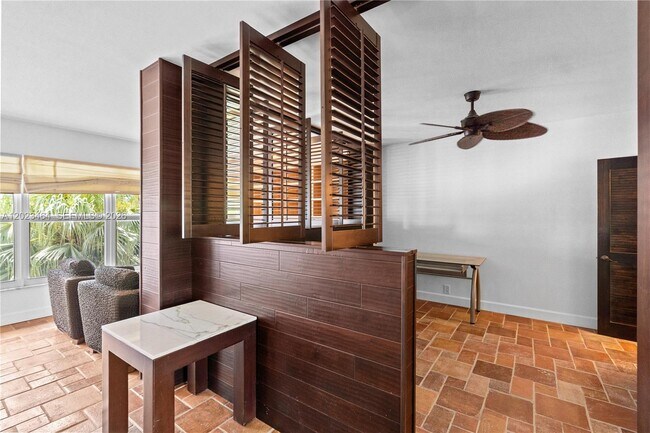 Building Photo - 10190 Collins Ave