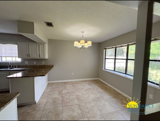 Building Photo - Charming 3-Bedroom Brick Home in Bluewater Bay Community, Caribbean East
