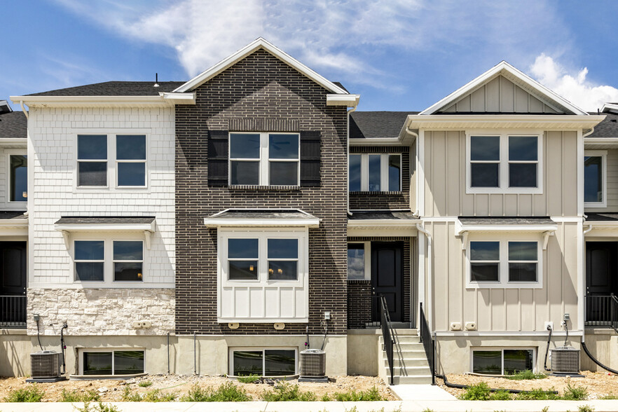 Exterior (Middle Townhome-brick and black door) - 12981 S Oberon Ln