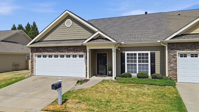 Building Photo - Experience refined, low-maintenance living in this beautifully appointed end-unit townhome