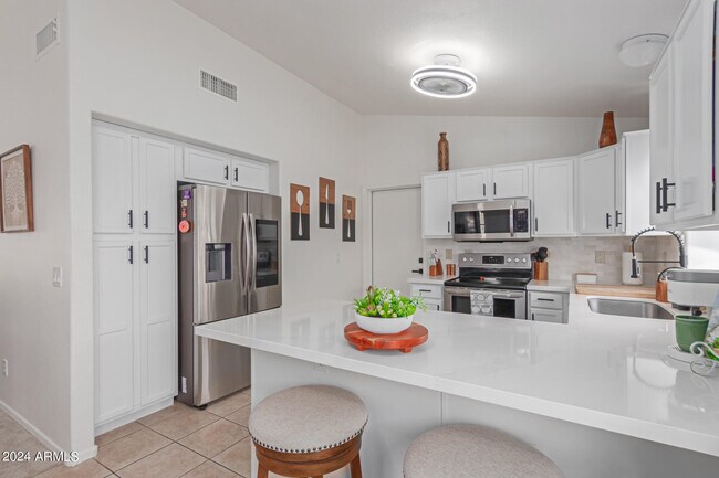Building Photo - 9922 E Onza Ave