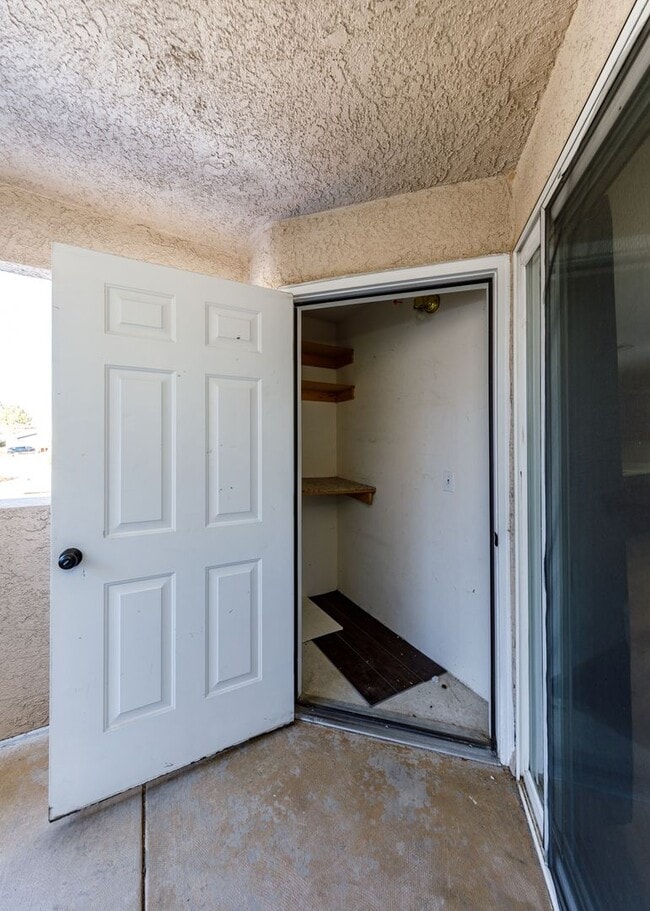 Building Photo - 3 Bed Top Floor Condo near Ft. Carson in Gated Community with detached Garage