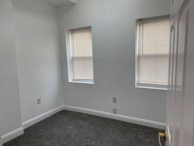 Building Photo - Charming 2-Bedroom, 1.5-Bathroom Brick Townhouse in Pigtown