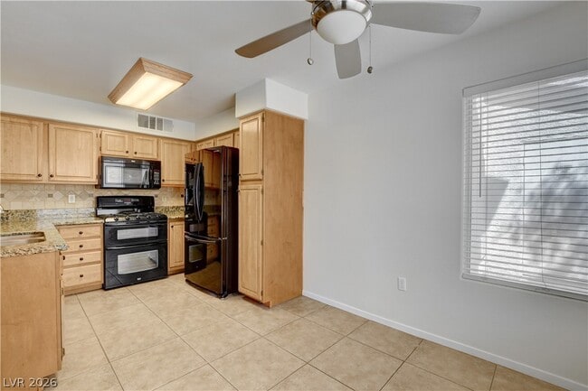 Building Photo - 5710 E Tropicana Ave