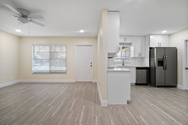Building Photo - ANNUAL RENTAL - 2 Bedroom, 1 Bath w/ Garag...