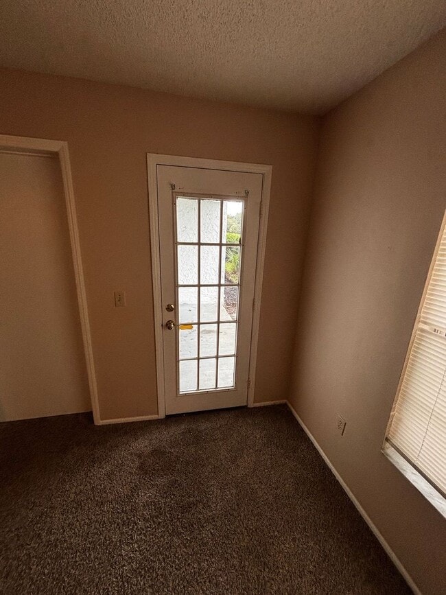 Building Photo - Downstairs 2/2 Country Club Village Condo ...