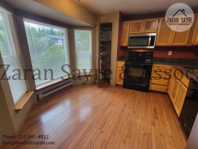 Building Photo - 002 Cozy Rambler