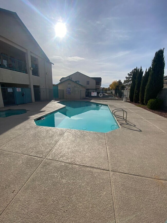 Building Photo - AMERICANA Property Mgmt - 1 bed Condo in Gated Community near The Strip