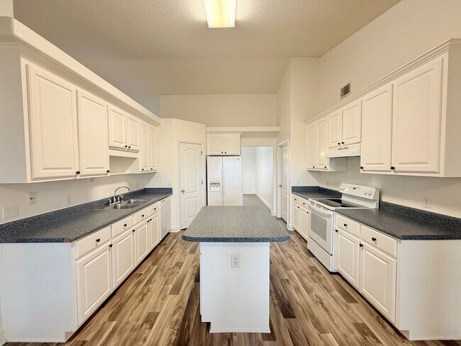 Building Photo - Spacious 4-Bedroom, All-Brick Home