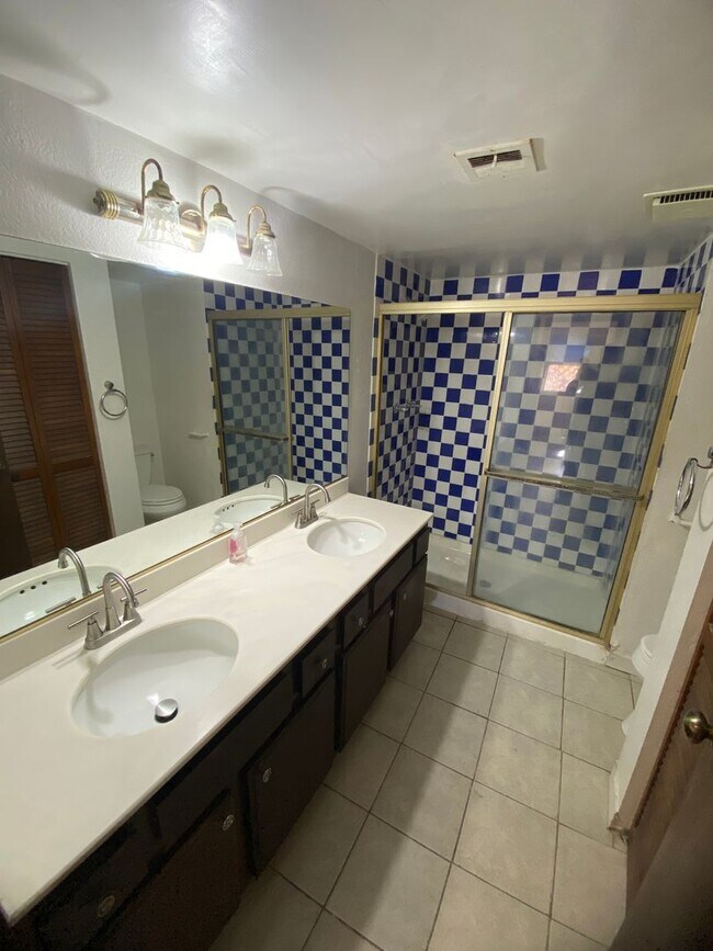 Building Photo - AMERICANA Property Mgmt - Downstairs 2 Beds condo in Spring Valley