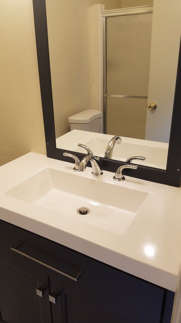 Building Photo - 3 bedroom, 2 bath, ground floor unit, and private patio.