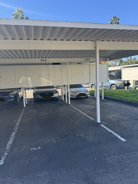 One covered parking spot with storage - 9408 Twin Trails Dr