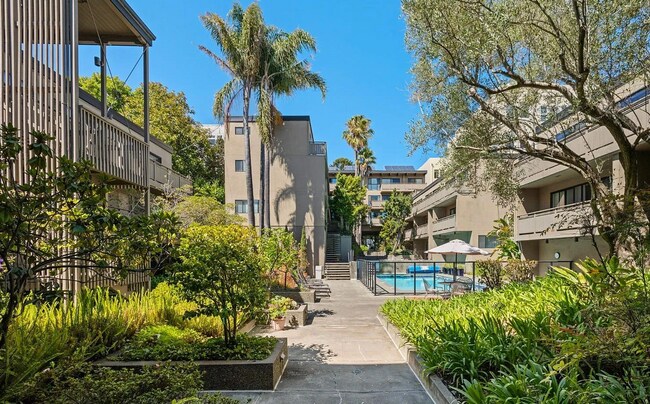 Building Photo - Modern 2BR/1.5BA Two-Level Condo w/ Patio ...