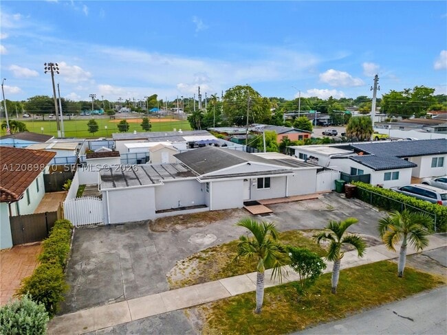 Building Photo - 6049 W 14th Ln