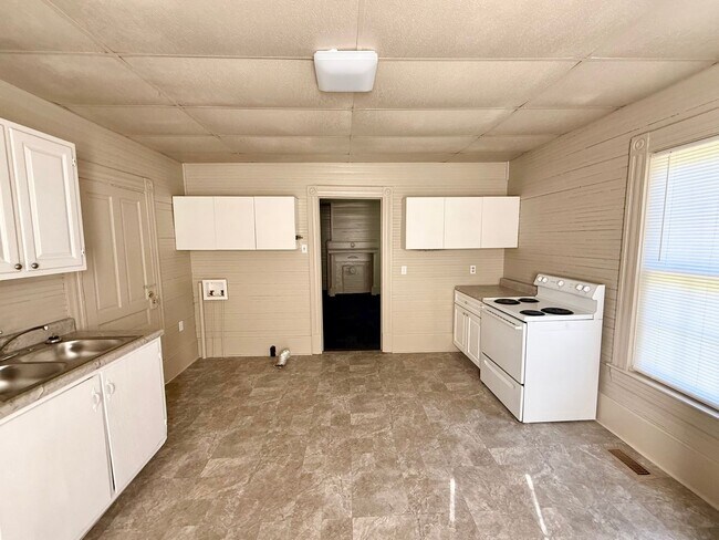 Building Photo - Three Bedroom, 1 Bath Gibsonville Home with Rocking Chair Front Porch