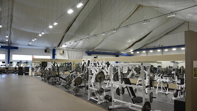 Convenient access to a huge, never-busy weight-lifting room (membership required). - 17 Racquet Club Rd