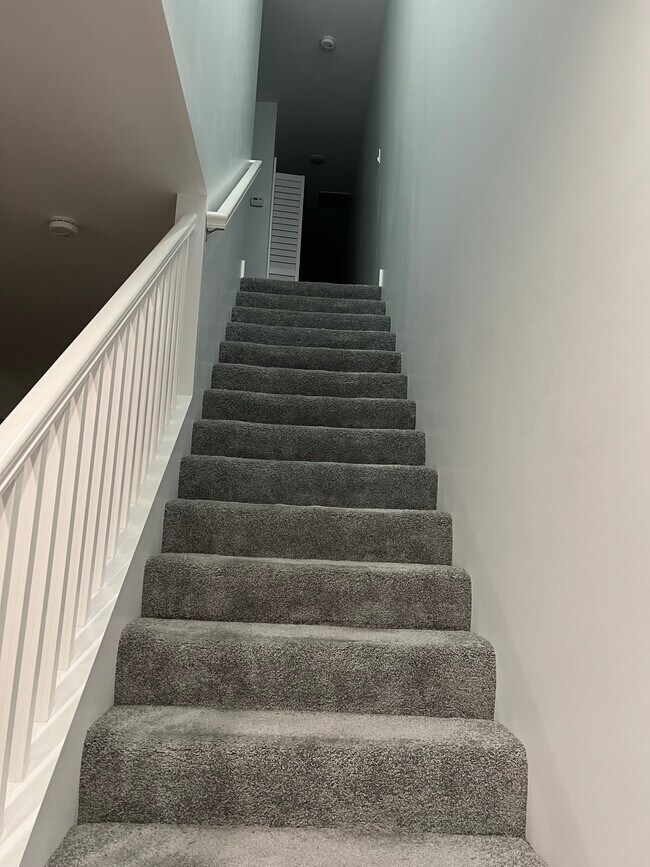 Stairs to third level - 6033 S Eberhart Ave