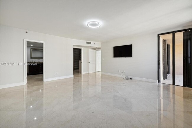 Building Photo - 10175 Collins Ave