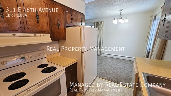 Building Photo - 311 E 46th Ave