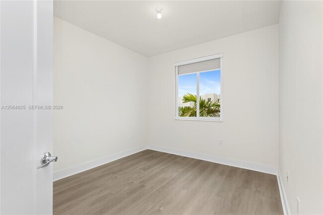 Building Photo - 6416 NW 102nd Ct