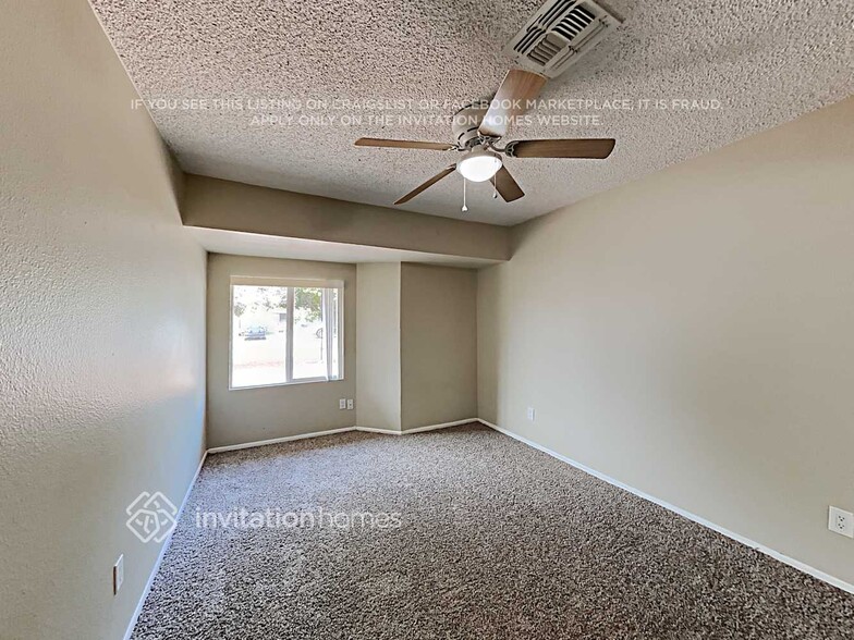 Building Photo - 6015 W Loma Ln
