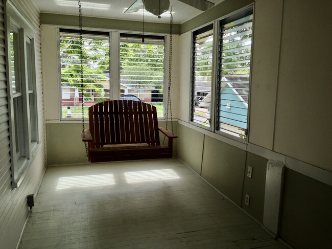 Porch swing included - 720 W Hancock St