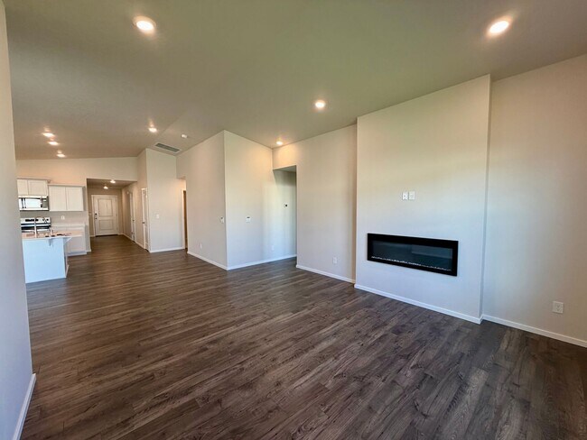 Building Photo - Beautiful & Brand New- 4 bed, 2 bath w/Quartz Countertops & Fenced Yard