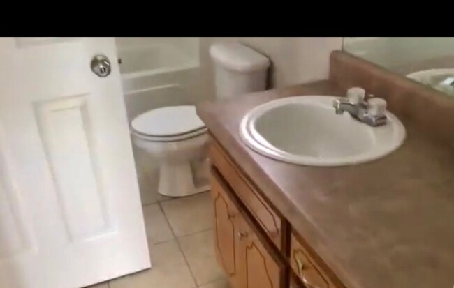 Building Photo - Nice three bedroom two bath two-story in A...