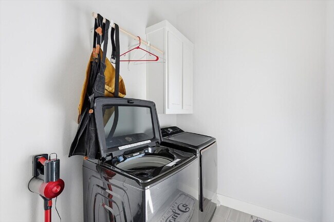 Building Photo - Cozy home in Merion at Midtown Park, one of Dallas's most convenient and family-friendly communit...