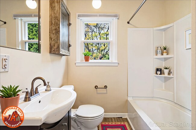 Building Photo - Sunny 2-Bedroom Home in Roosevelt Park | Fenced Yard + Basement