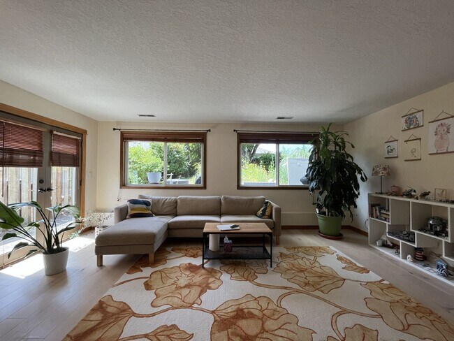 Building Photo - Bright and Open 4 Bedroom Cedar Mill Home with Vaulted Ceilings, Skylights & Multiple Living Areas