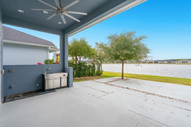 Building Photo - Luxurious Solar Powered 4 Bedroom, 3 Bath Waterfront Home with office & Upgrades Galore!