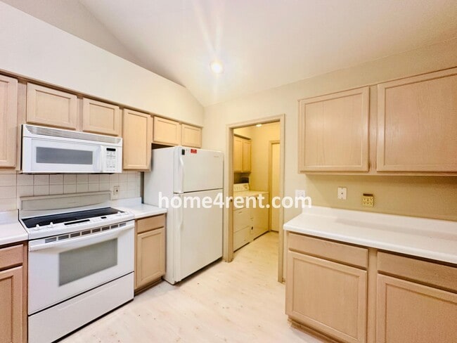Building Photo - Maintenance FREE, Ranch Style Townhome w/ ...