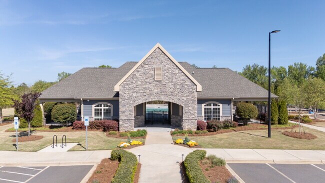 Building Photo - "Discover Spacious Living: 5-Bedroom Craftsman Home in Gated and Amenity-Rich Bretagne with Top-R...