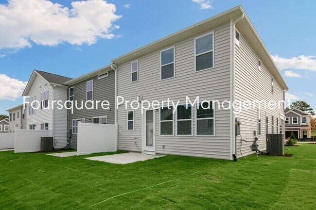 Building Photo - Bright 3-Bed 2.5-Bath End-Unit Townhome with Washer/ Dryer, Granite Kitchen & 2-Car Garage.Conven...