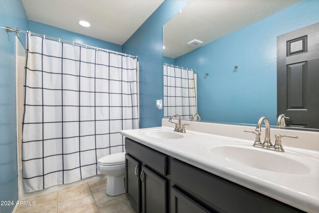 Building Photo - 4512 W Stoneman Dr