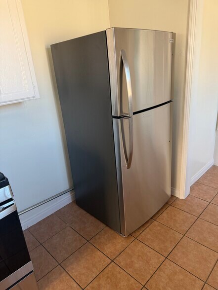 New refrigerator - 6133 S Harvard Blvd