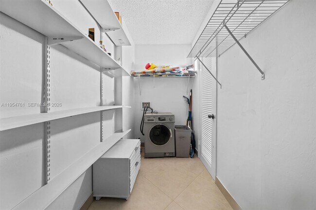 Building Photo - 19390 Collins Ave